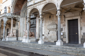 View of the Arches near the Door of the Cathedral of Cremona with the Statues of the Two Lions, Lombardy, Italy