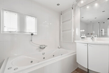 Bathroom in white style with all amenities and white tiles - obrazy, fototapety, plakaty
