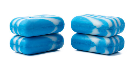 Stacked blue soap bars isolated on white background
