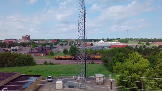 Cell phone tower with 5G technology updates needed stock video by aerial drone footage 7