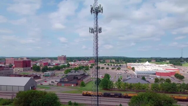 Cell phone tower with 5G technology updates needed stock video by aerial drone footage 2