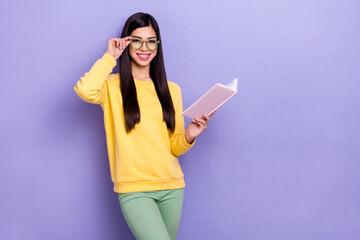 Photo of young cheerful lady eyewear courses lecture academic college isolated over violet color...