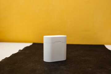 Bright musical headphones lie on a table