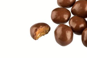 bitten chocolate balls isolated on white background with clipping path