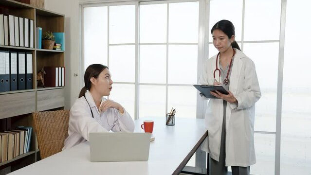 4k, an Asian female medical student wearing a white shirt  ask for advice. about the sickness of the patient and the doctor's teacher in the office of the hospital