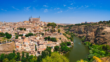 An overview of the city of Toledo and Tagus River - obrazy, fototapety, plakaty