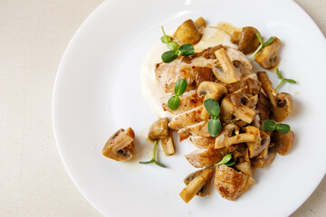 Turkey and mushroom dish with bechamel sauce.