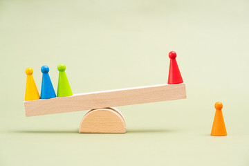 Unequal struggle: concept / metaphor with wooden chips