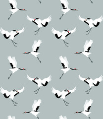 Seamless pattern with red-crowned cranes on gray background, vector illustration