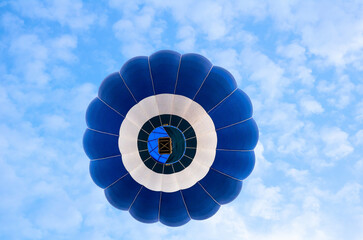 Hot air balloon flight over blue sky
