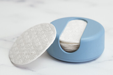 Reusable Cotton Rounds makeup remover in a container made from recycled ocean plastic. Zero waste pads for to reduce environmental pollution.