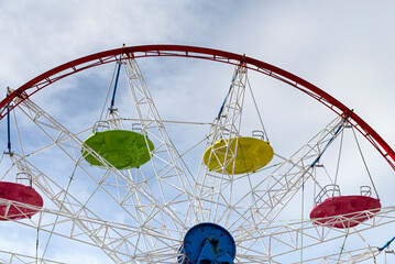 Colourful Ferris wheel against the sky