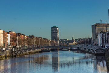 Fototapeta premium The Penny Ha'penny Bridge over the River Lifey, close up photography, A pedestrian bridge originally called the Wellington Bridge, Dublin, Ireland