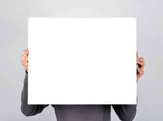 person holding a blank billboard