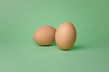eggs on olive background. chicken eggs on a green background