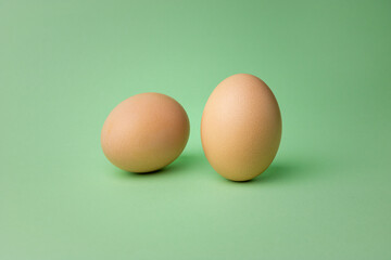 eggs on olive background. chicken eggs on a green background