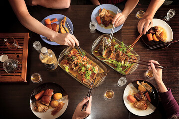 Chinese food with chopsticks, view above
