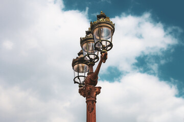 Fototapeta na wymiar Old public Paris streetlight (located at Place de la Concorde in the 8th Arrondissement).