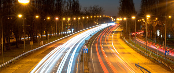 long exposure of city traffic at night in frankfurt main, germany