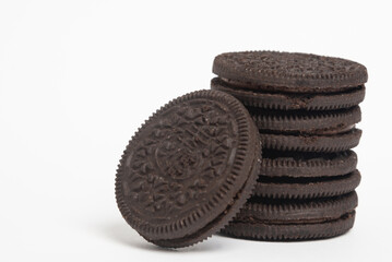 soft dark chocolate brownie cookies on white background.