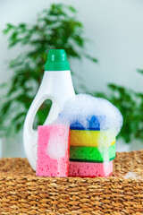 Eco household cleaner and sponge with foam. Selective focus.