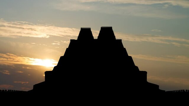 Aztec Templo Mayor: Time Lapse at Sunrise with Colorful Sky and dark Silhouette of aztec pyramid, Mexico