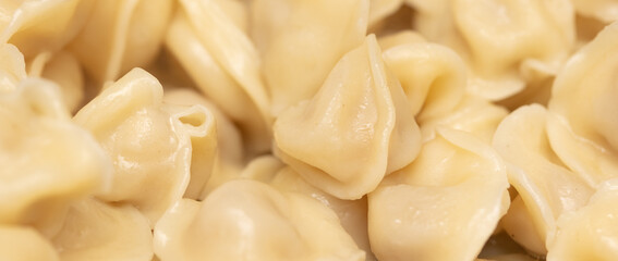 Boiled dumplings made from dough and meat.