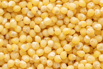 Close-up of millet groats as background.