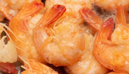 Close-up of boiled shrimp as background.