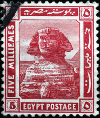 Enigmatic sphinx on old egyptian postage stamp