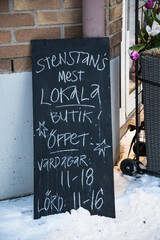 Sundsvall, Sweden A sign in front of a local delicatessen says in Swedish: "Sundsvall's most local boutique."
