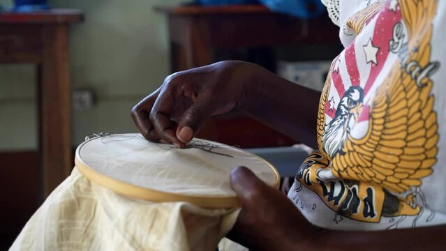 Close up Hands. African Woman making embroidery