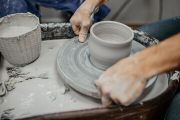 Modeling clay on a potter's wheel