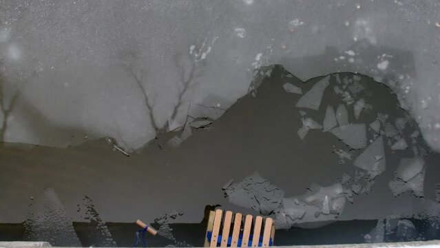 Wooden Sled on Thin Ice Lake, Danger of Drowning in Ice-Hole in Winter