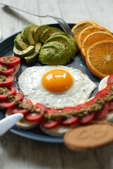 fried eggs with vegetables