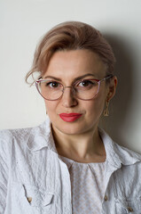 Portrait of Ukrainian smiling woman with glasses