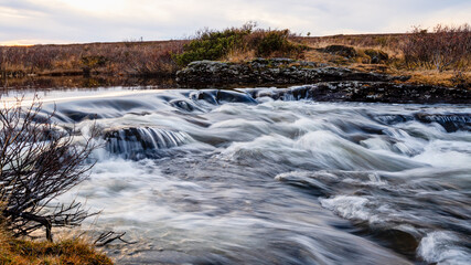 River in Norway, Europe with a long exposure.In a peat wet landscape.