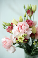 Bouquet with pink carnations and eustoma