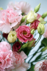 Bouquet with pink carnations and eustoma