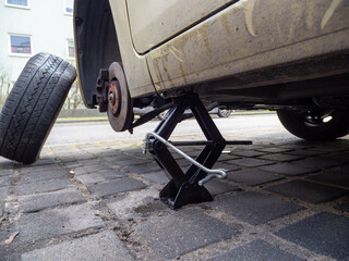 Wheel replacement. Jack up the car.