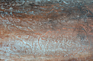 Macro Image of Old Blue and Black Paint on False Wood