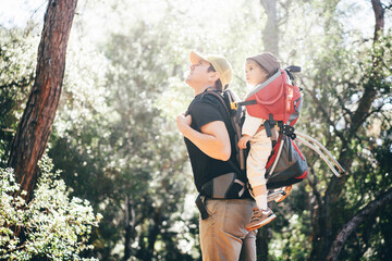 Father And Daughter Hiking Together.