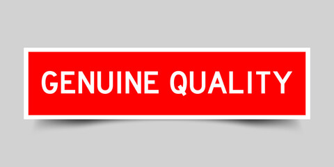 Sticker label with word genuine quality in red color on gray background