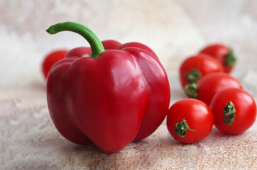 Red ripe peppers and tomatoes close-up. Fresh and healthy vegetables	