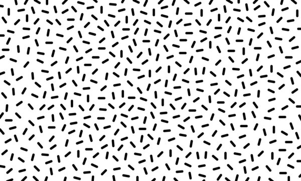 Black capsule shaped scattered pattern on white background vector