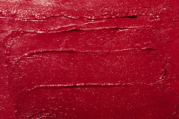 Beauty swatches. Lipsticks smear, palette of smudged lipsticks isolated on white background. Red color of cosmetic product smear sample