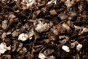 Texture background of wooden gold with mica, macro