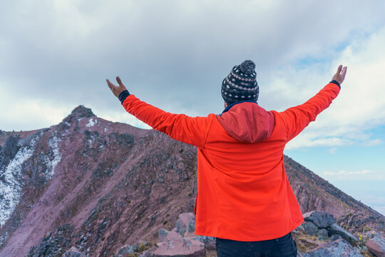 Man standing on mountain top
