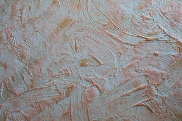 Stucco wall with gold paint