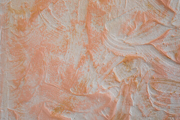 Stucco wall with gold paint